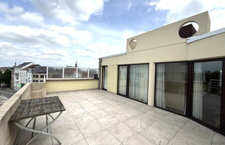 Uniek penthouse appartement met ruime zonneterrassen en zicht op de Gentse torens